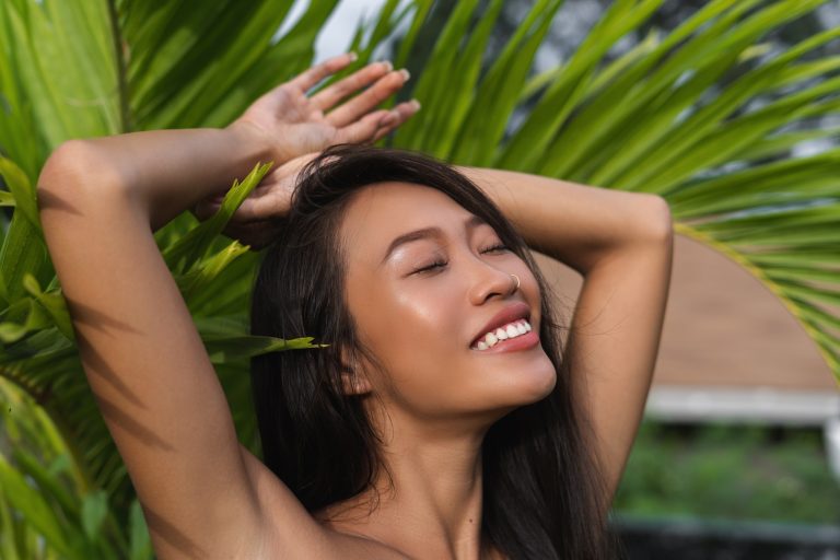 Beautiful asian thai woman with soft smooth clean dark tanned skin