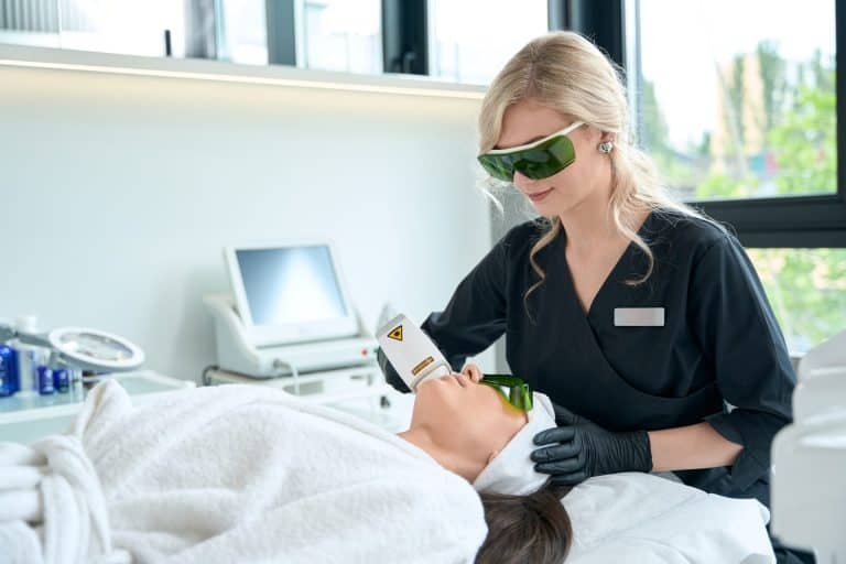 Portrait of dermatologist doing face laser hair re 2024 10 18 08 45 31 utc