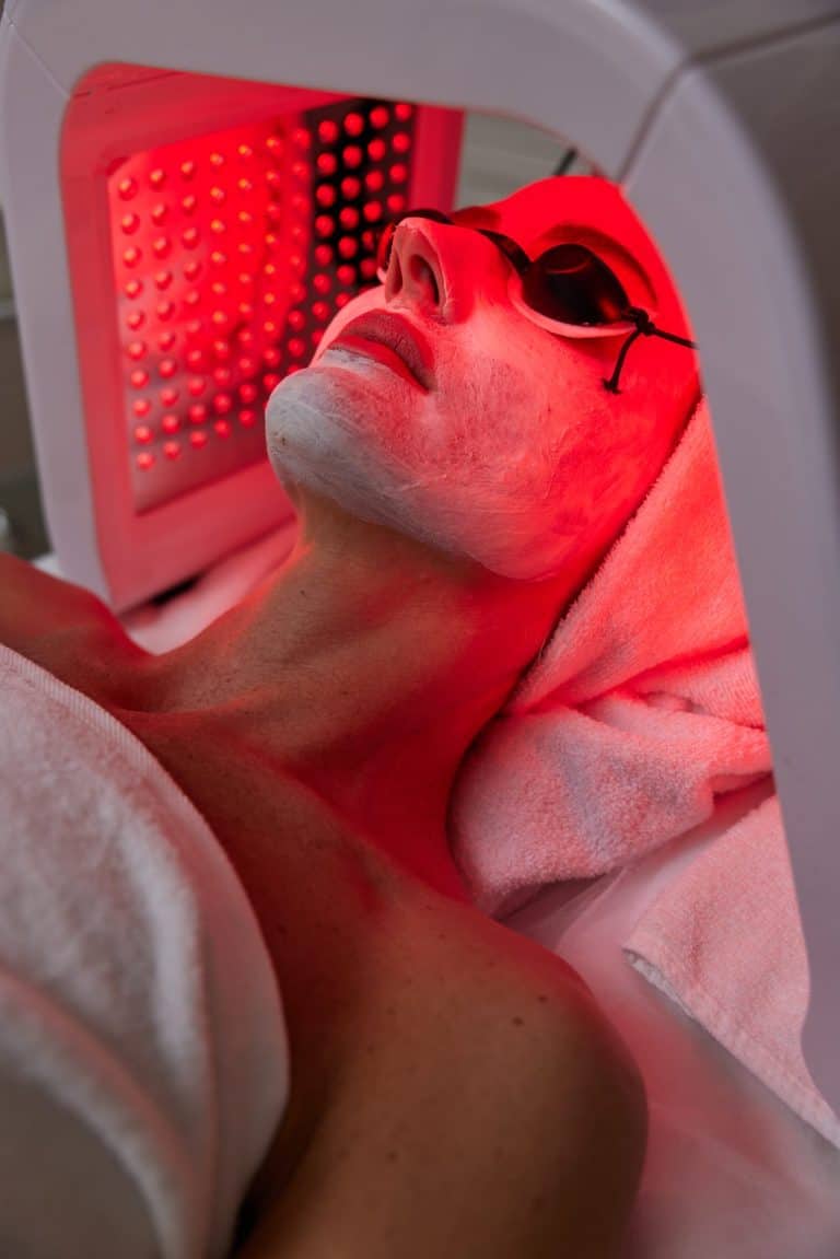 Woman getting facial treatment with led therapy 2024 10 22 03 06 18 utc