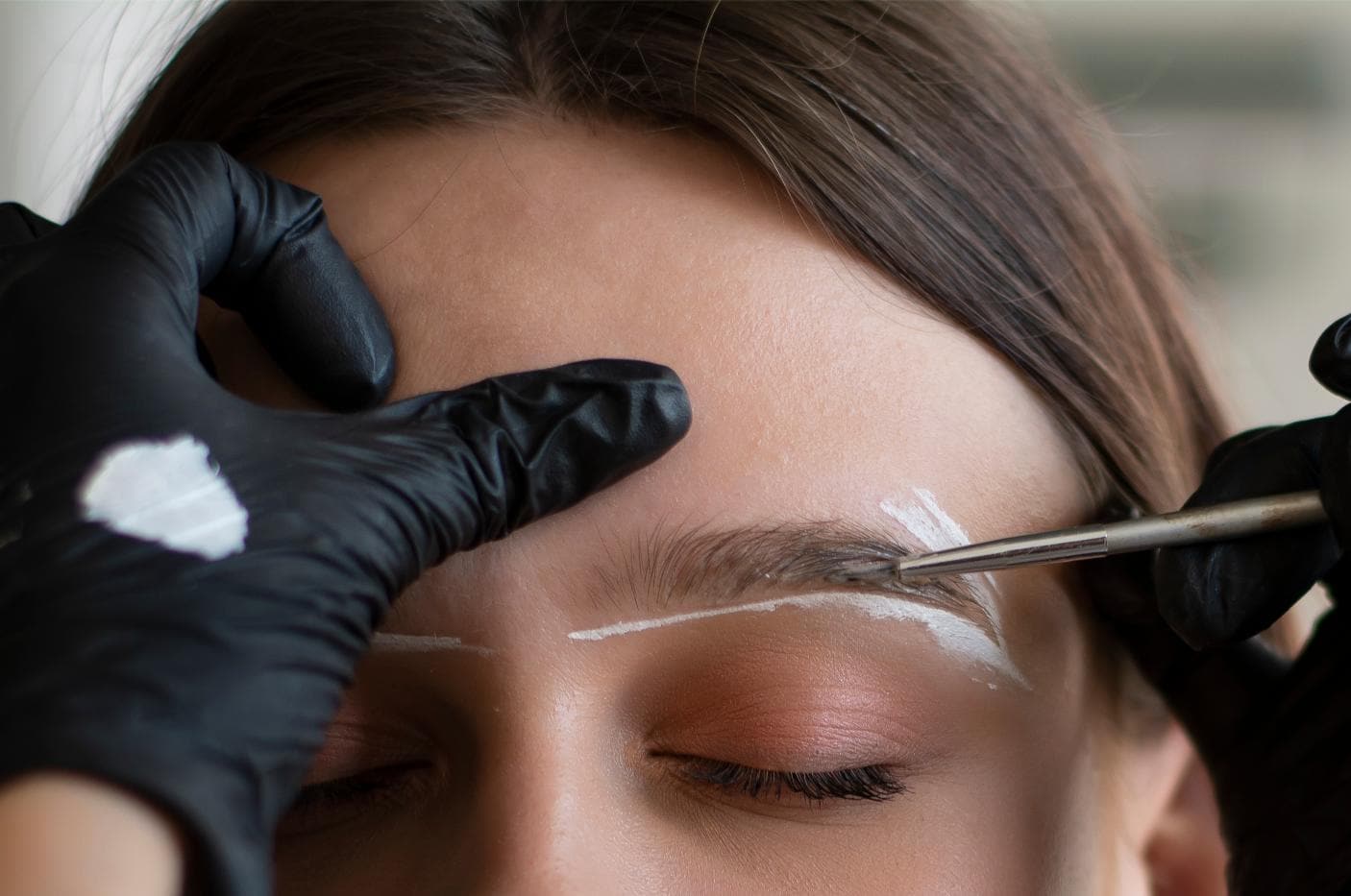 Young woman undergoing eyebrow correction procedur 2026 03 16 05 10 06 utc
